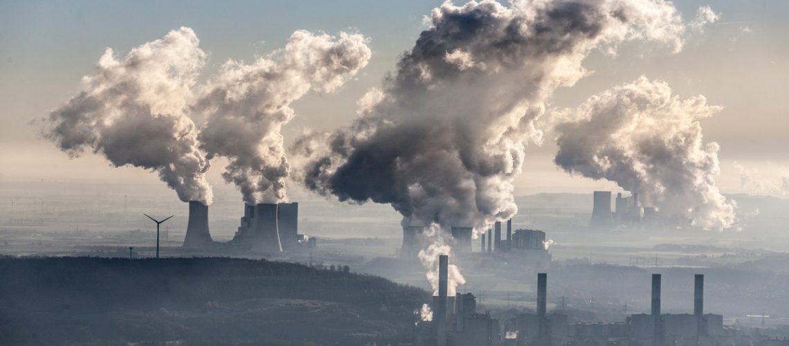 Aerial photo of coal fired power stations Neurath near Grevenbroich and Niederaussem near Bergheim in the Rhenish lignite mining area. Steam coming out of cooling towers. Windturbines near the plant.
Luftaufnahme der Braunkohlekraftwerke Neurath bei Grevenbroich und Niederaussem bei Bergheim im Rheinischen Braunkohlerevier. Dampf steigt aus Kuehltuermen auf. Windmuehlen in der Naehe der Kraftwerke.
